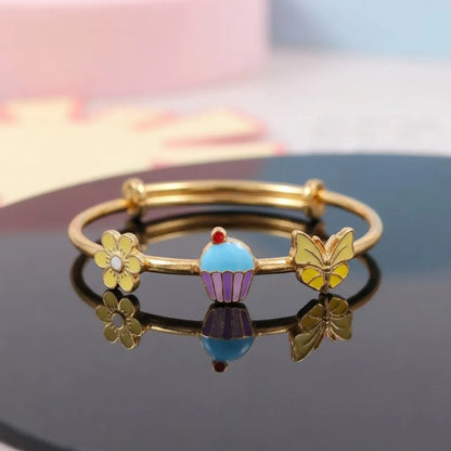 Silver Sweet Bloom Silver Kada – Flower, Cupcake & Butterfly – Reflective studio view