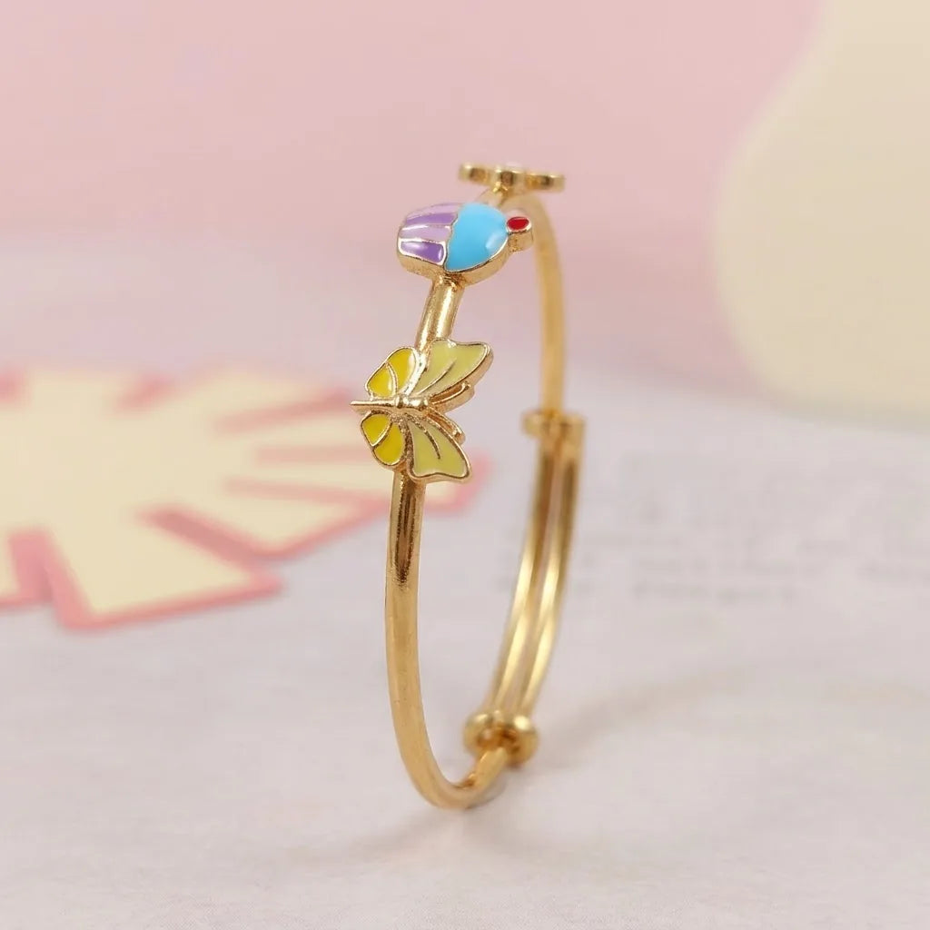 Silver Sweet Bloom Silver Kada – Flower, Cupcake & Butterfly – Side silhouette