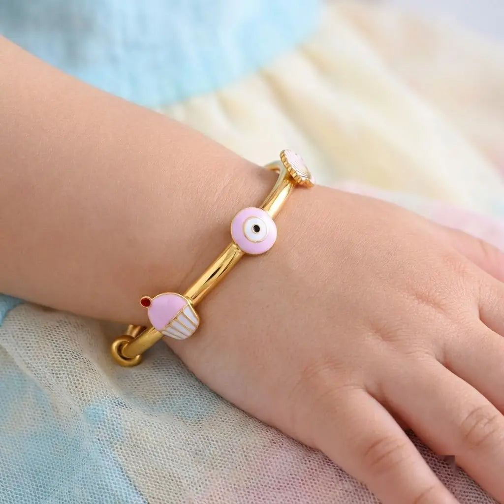 Silver Pink Evil Eye Adjustable Kada – Product shown on a child’s wrist