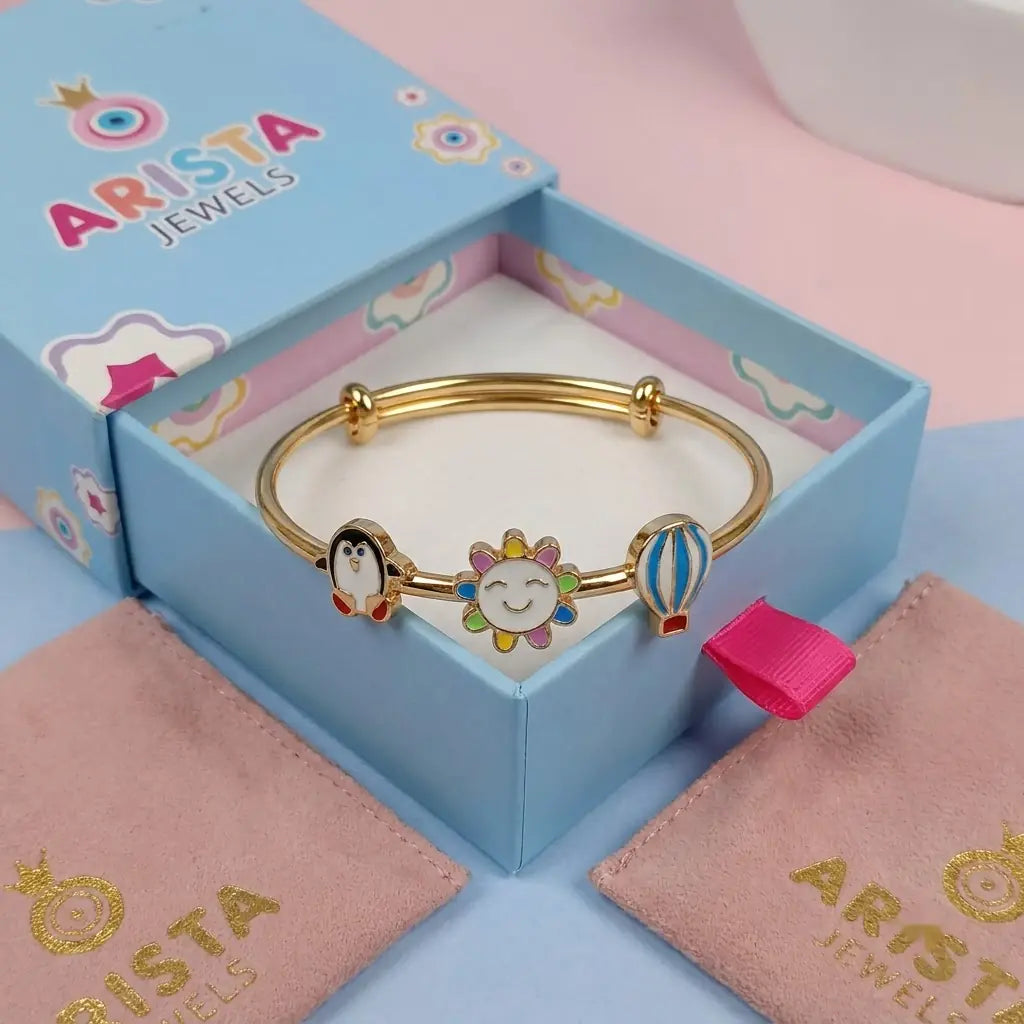 Silver Sunshine Adventure Silver Kada – Penguin, Smiling Sun & Hot Air Balloon – Arista Jewels packaging
