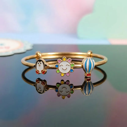 Silver Sunshine Adventure Silver Kada – Penguin, Smiling Sun & Hot Air Balloon – Reflective studio view